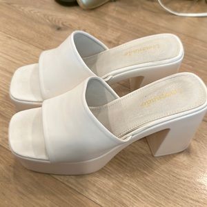 White/cream colored pumps size 8 only worn once